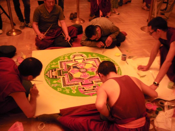 Tibetan lamas at work on the Mandala 