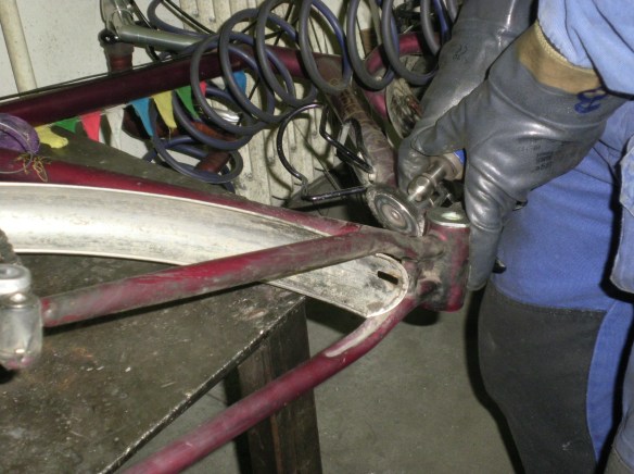 Paint in removed, and frame is prepped for welding