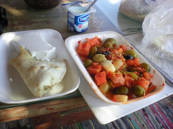 Standard Egyptian breakfast, Aiesh (Pita bread), Behoney ( fermented vegetables) and yogurt
