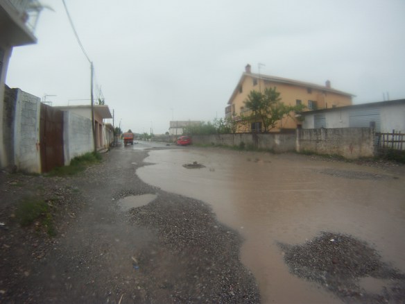 Rain in the village of Koman