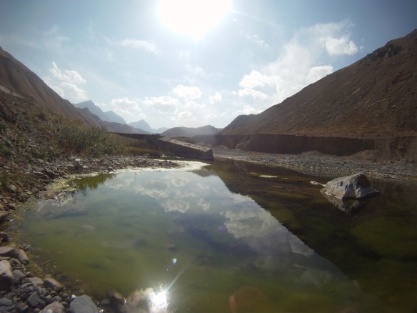 A moss covered lake near the highest pass, Alai mountains