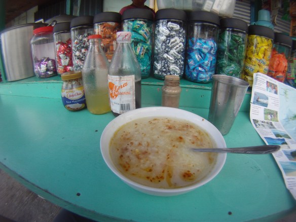 Rice soup and chili sauce breakfast