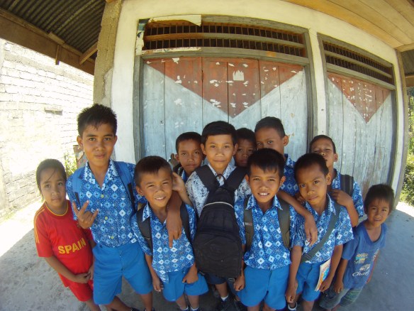 School kids who gathered round to watch me patch a tire