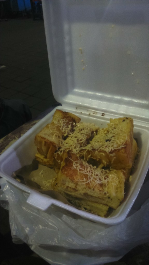Roti Panggang. Grilled cheese sandwich with caramel topping. Local Balinese snack found at the Pasar. 