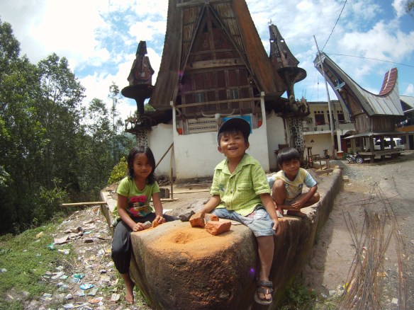 Village kids playing on a temporarily blue sky