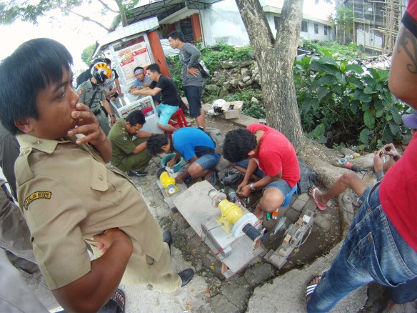 Street vendors selling Batu Aki on the streets of Rantepao (Gemstone rings)